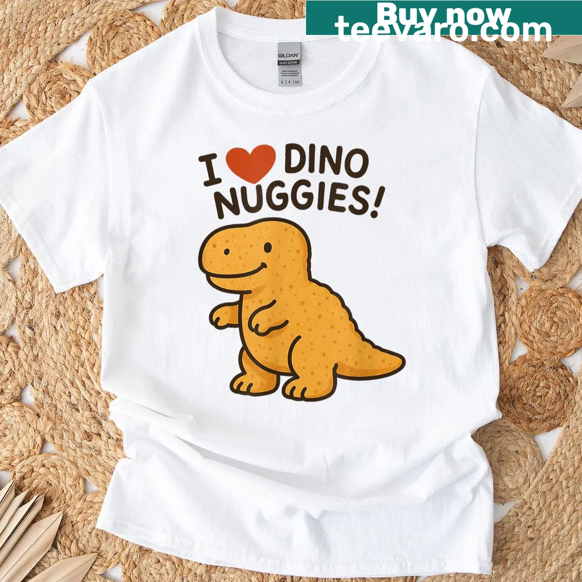 T-shirt with a dinosaur graphic and text about dino nuggets — on a men's t-shirt