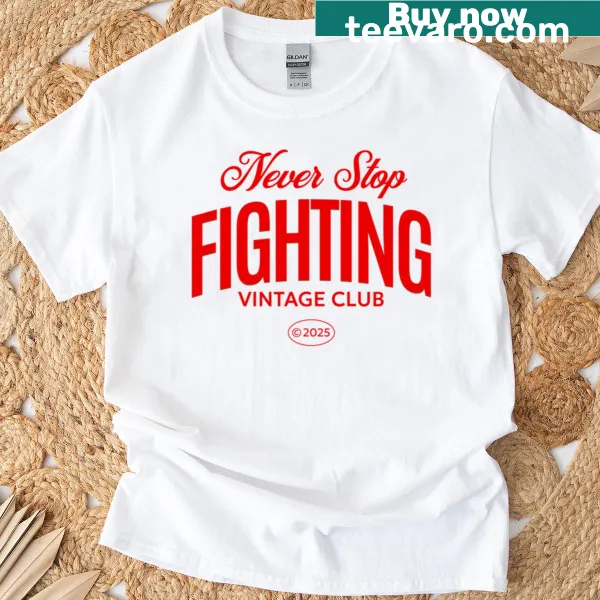 Vintage-style T-shirt with 'Never Stop Fighting' slogan prominently displayed