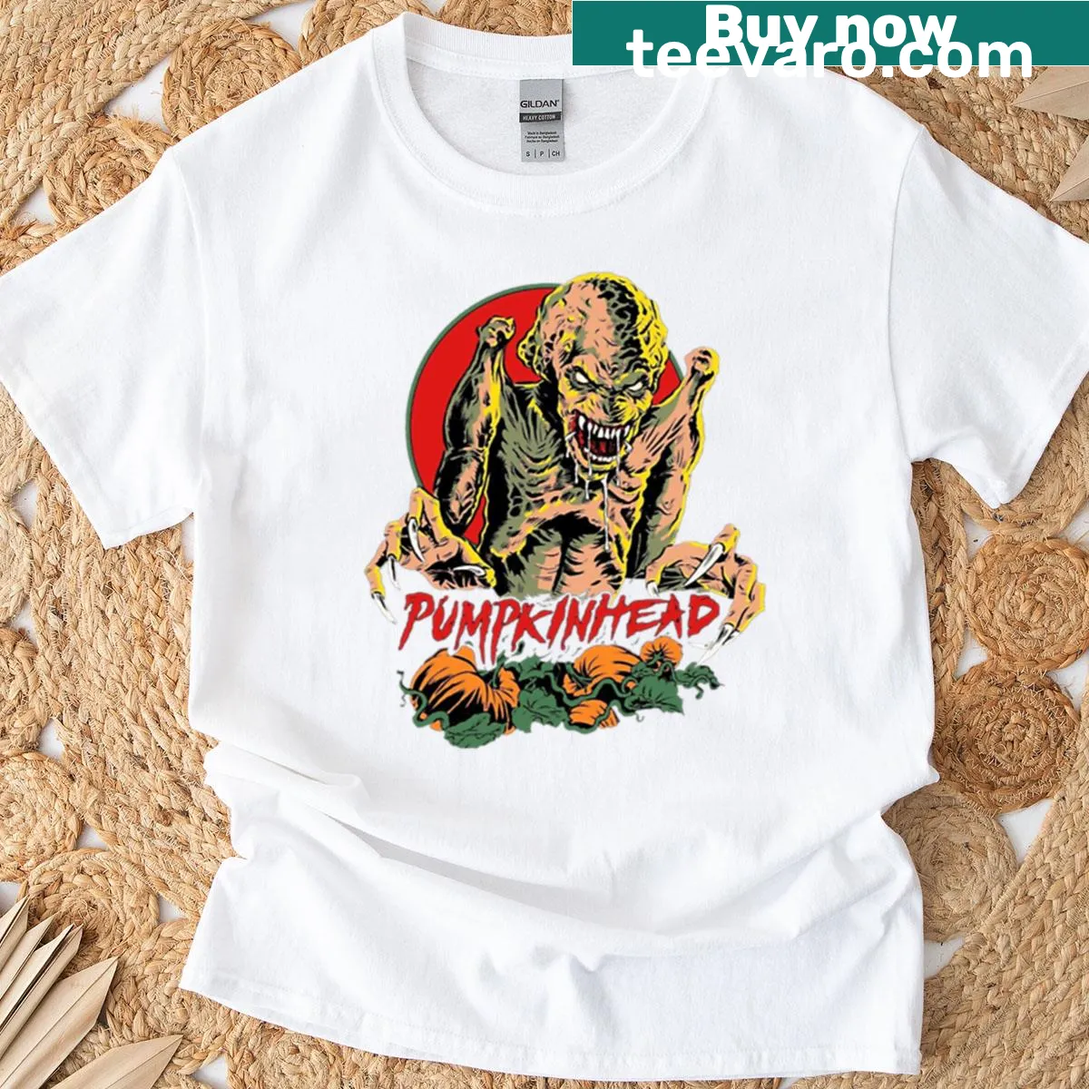 Illustrated Halloween t-shirt featuring a pumpkin monster design — on a men's t-shirt