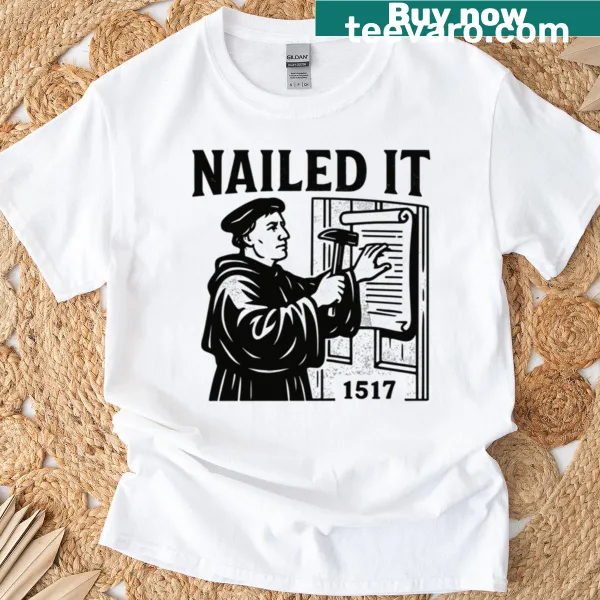 T-shirt featuring black lettering 'Nailed It' celebrating 1517 and Martin Luther