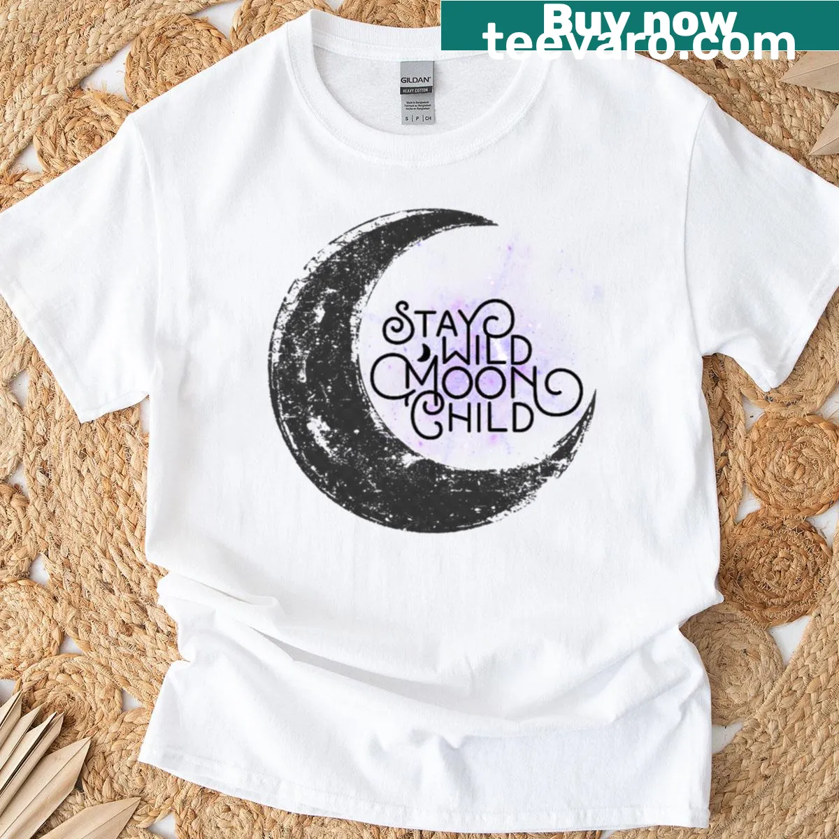 Celestial moon design with text 'Stay Wild Moon Child' on a T-shirt — on a men's t-shirt
