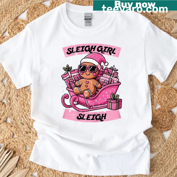 Cute t-shirt featuring a girl on a pink sleigh with gingerbread cookies