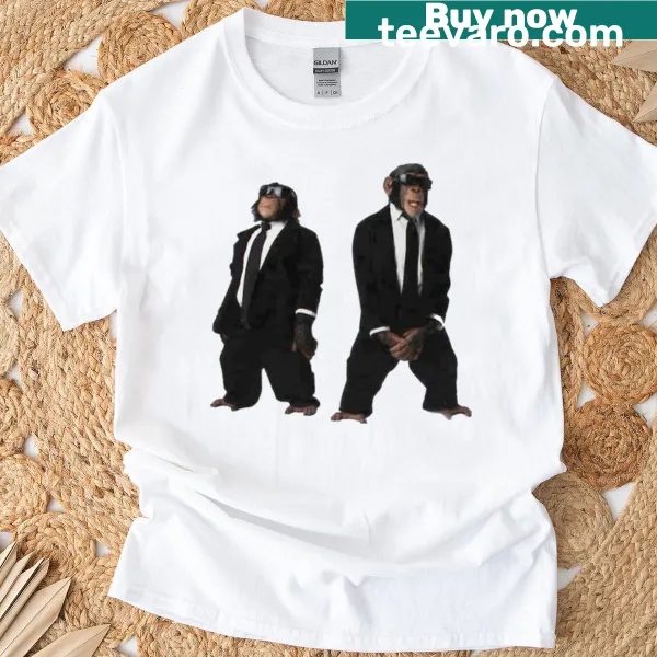 Cartoon graphic of two playful monkeys on a T-shirt.