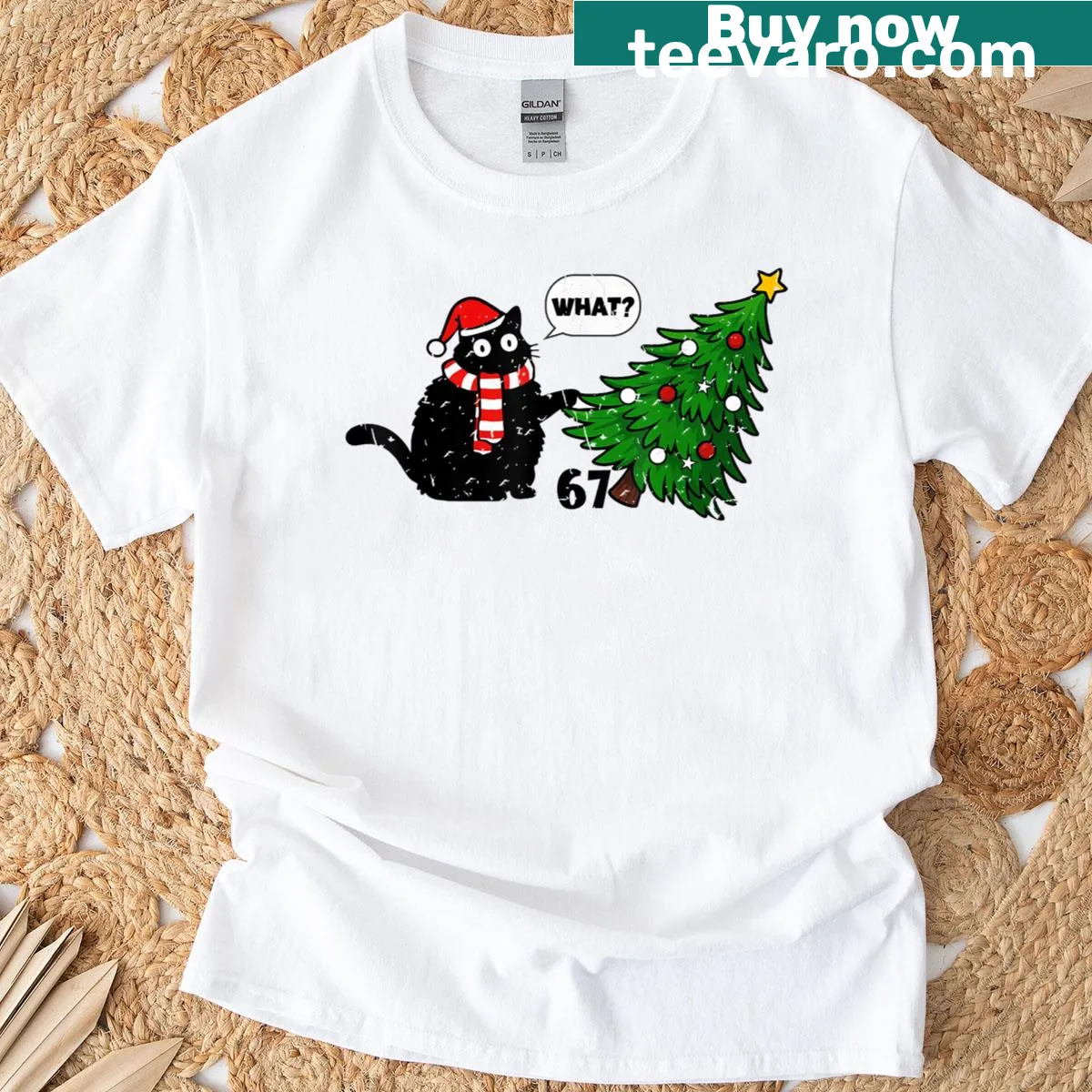 Whimsical black cat design pushing over a Christmas tree. — on a men's t-shirt