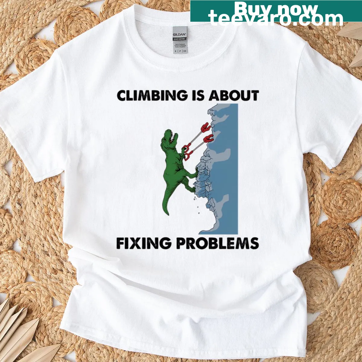 Funny T-Rex climbing design on a dinosaur-themed t-shirt — on a men's t-shirt