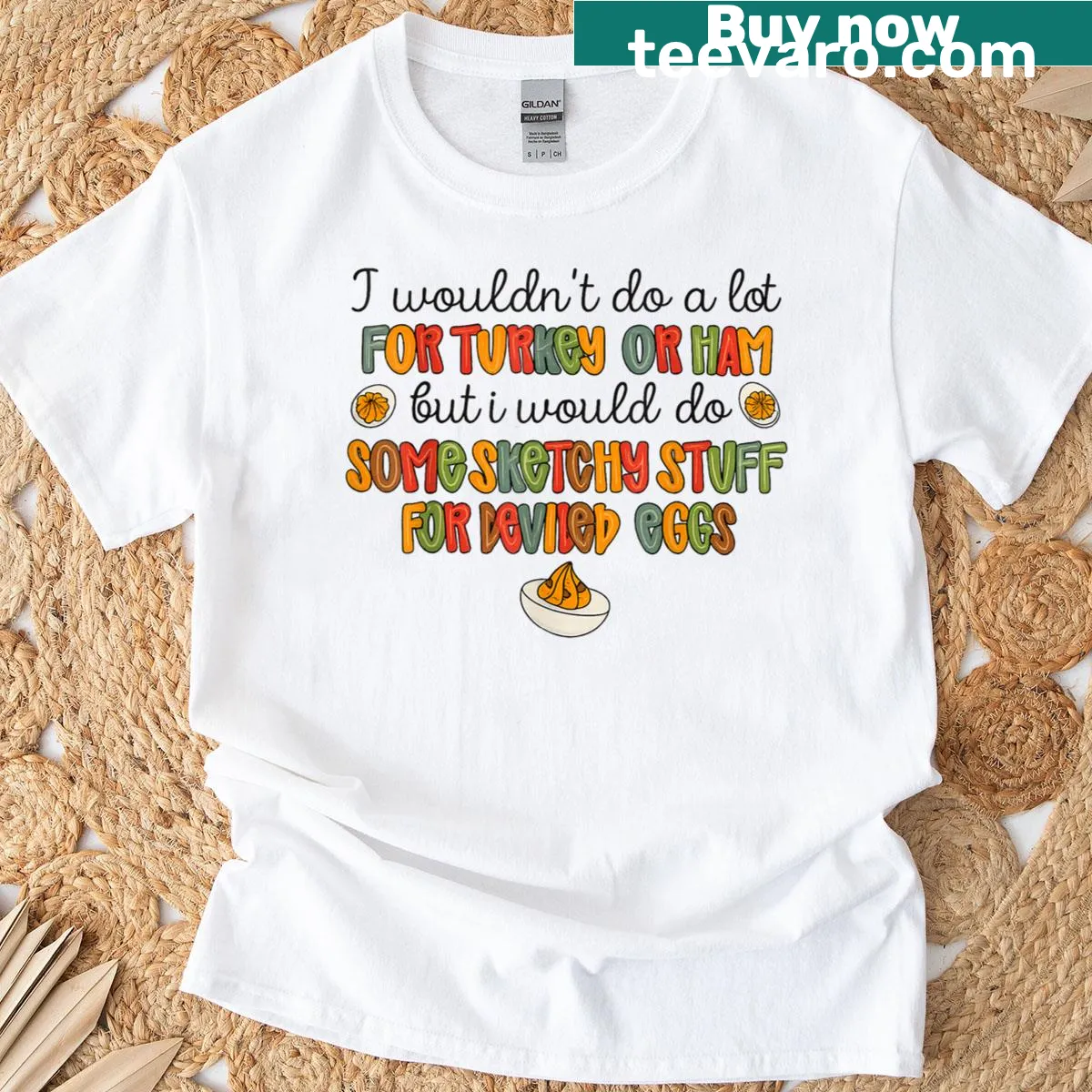 Thanksgiving t-shirt featuring funny deviled eggs illustrations — on a men's t-shirt