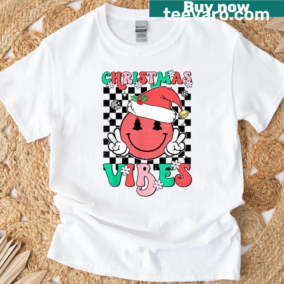 Cartoon Santa hat smiley face graphic on a Christmas T-shirt — on a men's t-shirt