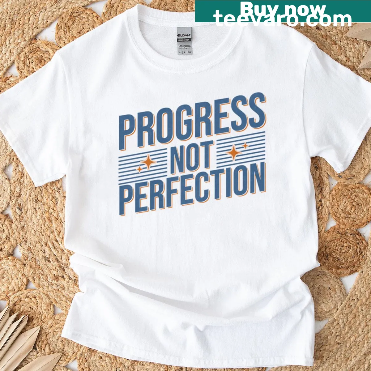 Motivational quote 'Progress Not Perfection' in retro typography on T-shirt — on a men's t-shirt