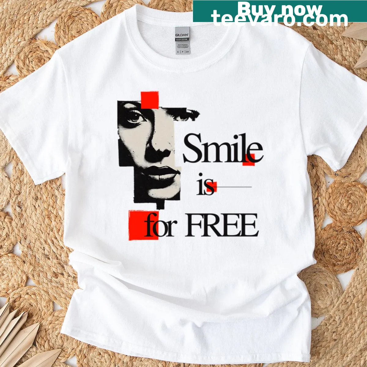 Modern typography T-shirt with 'Smile Is Free' design — on a men's t-shirt