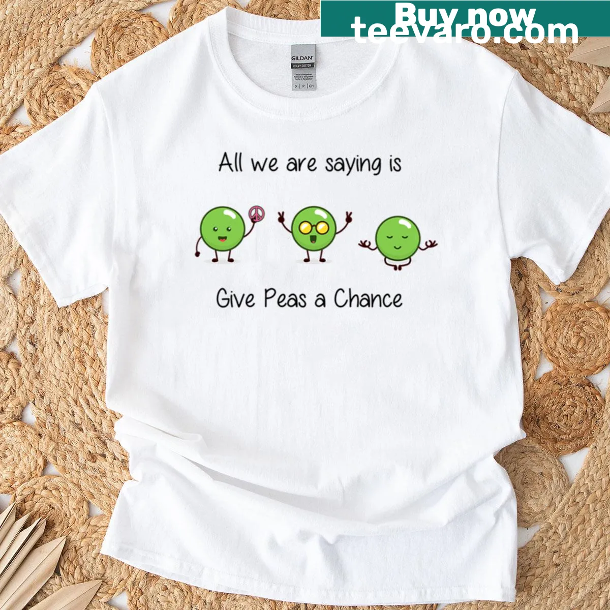 Whimsical T-shirt with the phrase 'All We Are Saying Is Give Peas A Chance' in bold typography — on a men's t-shirt