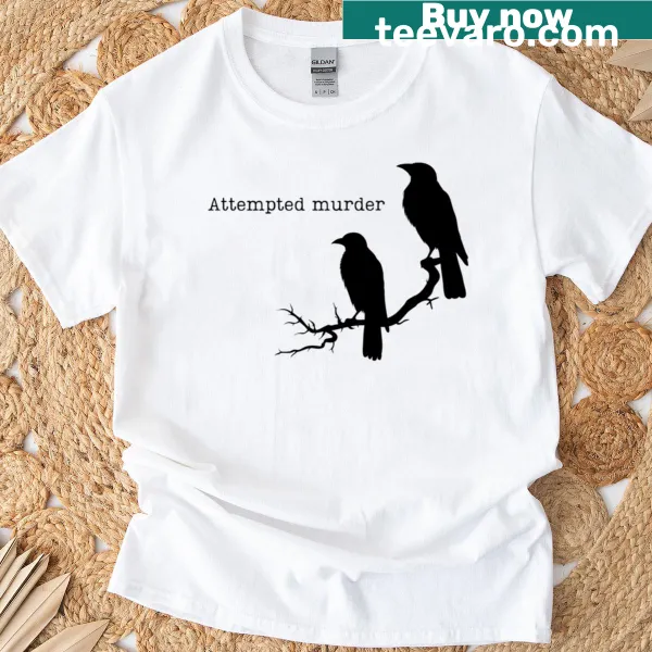 Bold raven graphic with the text 'Attempted Murder' on a t-shirt