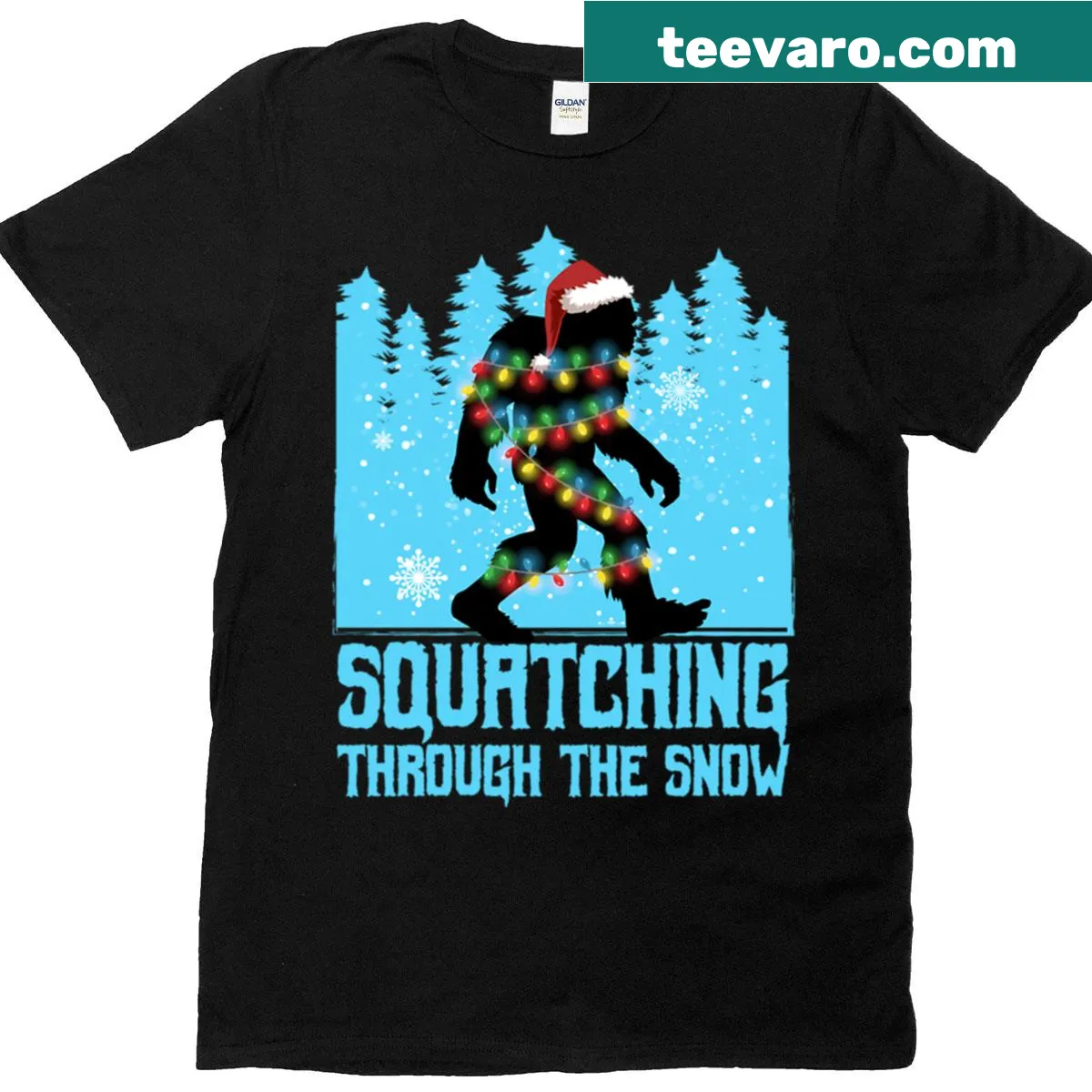 Playful illustration of Bigfoot walking through the snow t-shirt — on a men's t-shirt