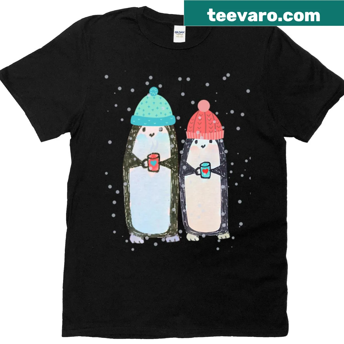 Adorable penguin couple t-shirt with snowflakes for winter — on a men's t-shirt