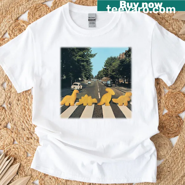 Whimsical t-shirt featuring cartoon dinosaur chicken nuggets