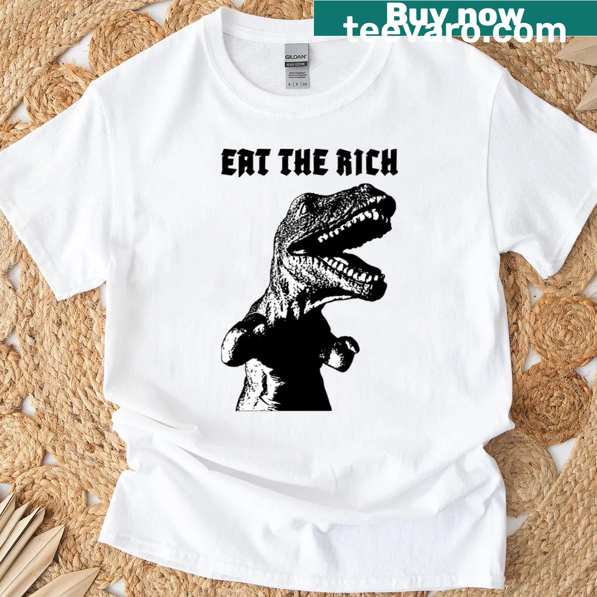 Bold T-shirt with 'Eat The Rich' text — on a men's t-shirt