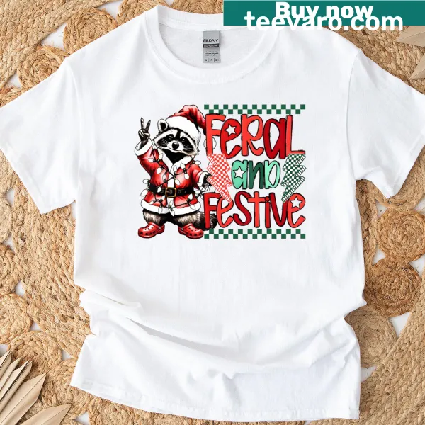 Funny Christmas T-shirt featuring a festive raccoon illustration