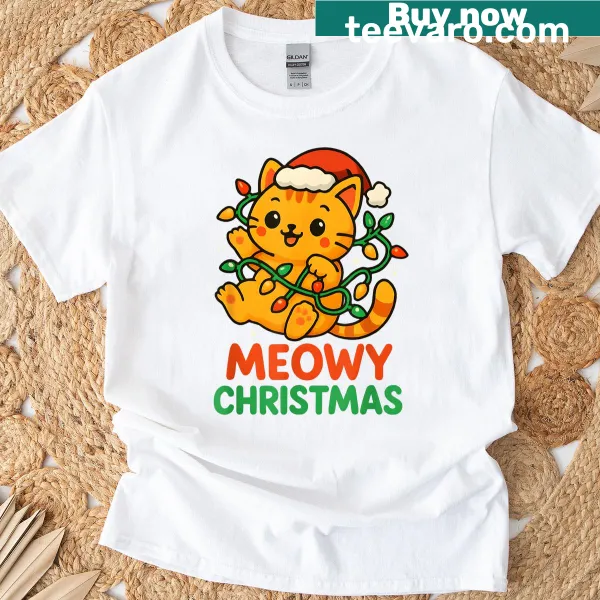 Cute orange tabby cat in a Santa hat on a Christmas T-shirt