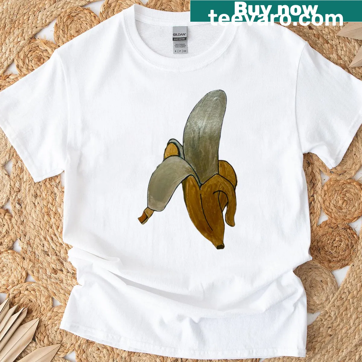 Whimsical T-shirt featuring a metallic banana graphic — on a men's t-shirt