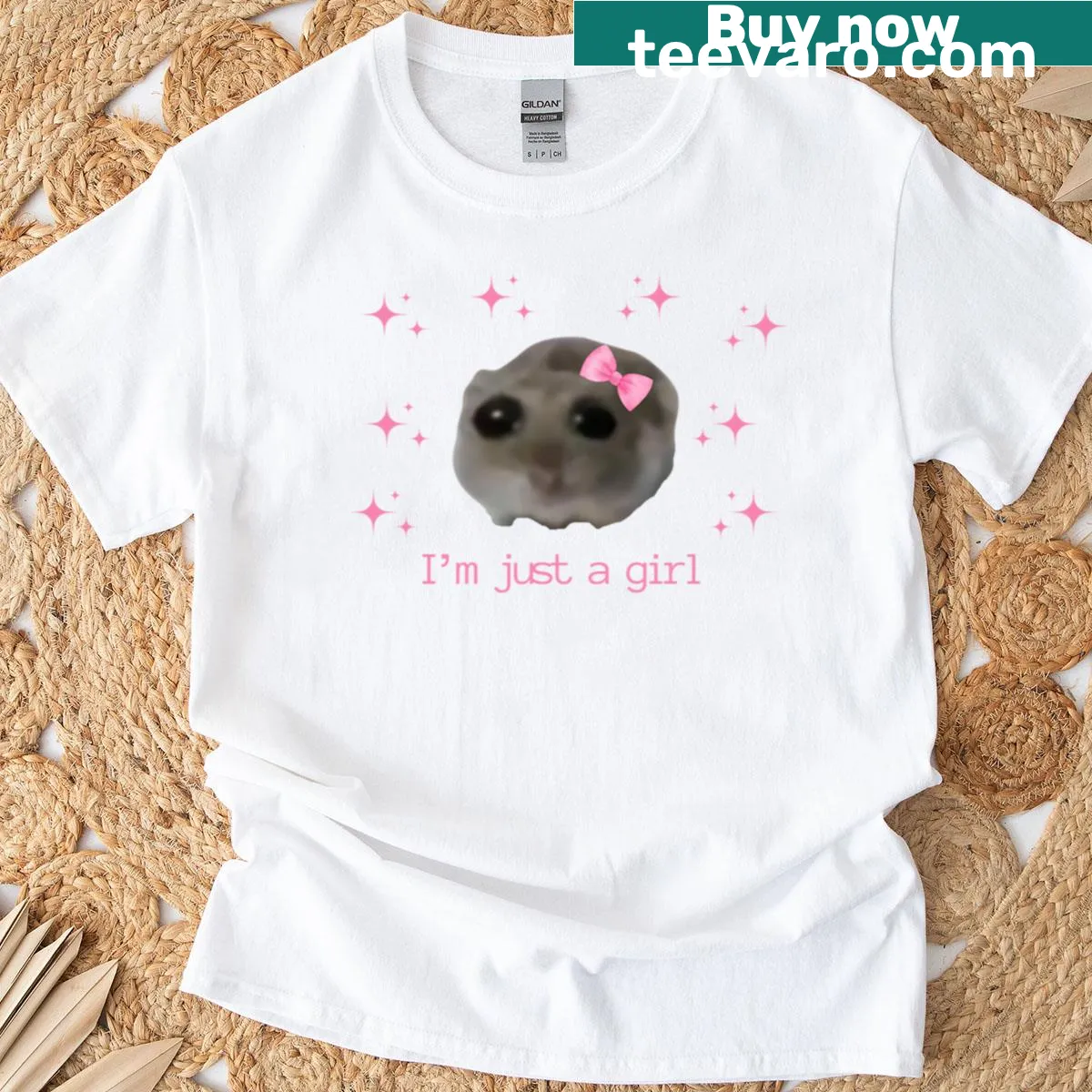 Graphic t-shirt featuring a sad hamster with the text I'm Just A Girl. — on a men's t-shirt