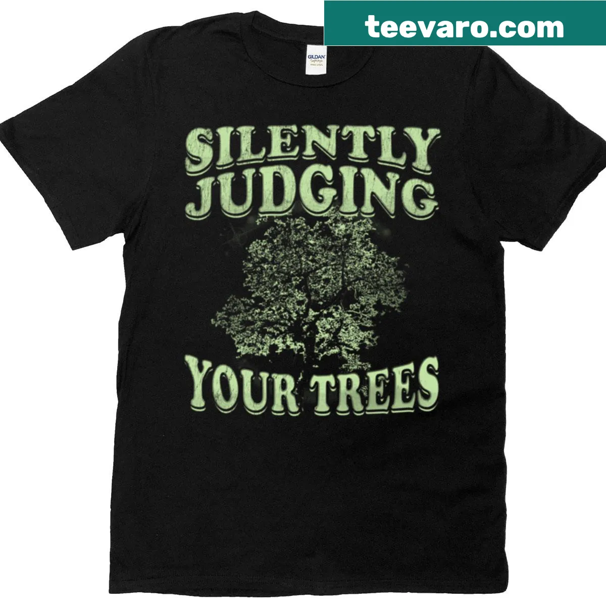 Witty Arborist T-shirt with a phrase about silently judging trees. — on a men's t-shirt