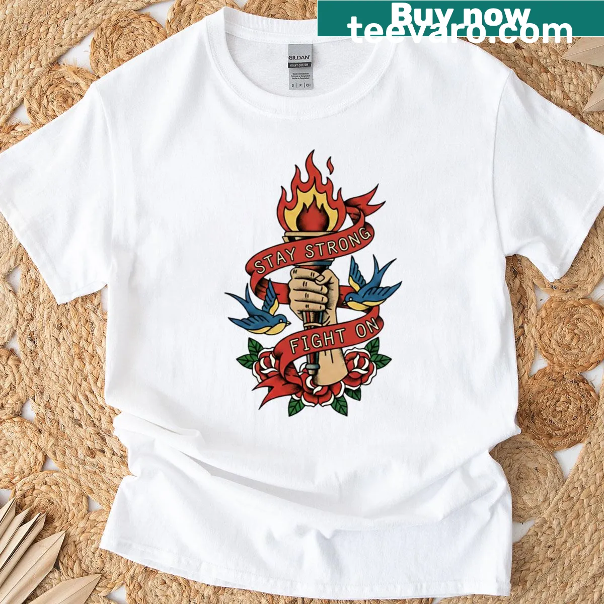 Resilience tattoo art T-shirt with torch and motivational text — on a men's t-shirt