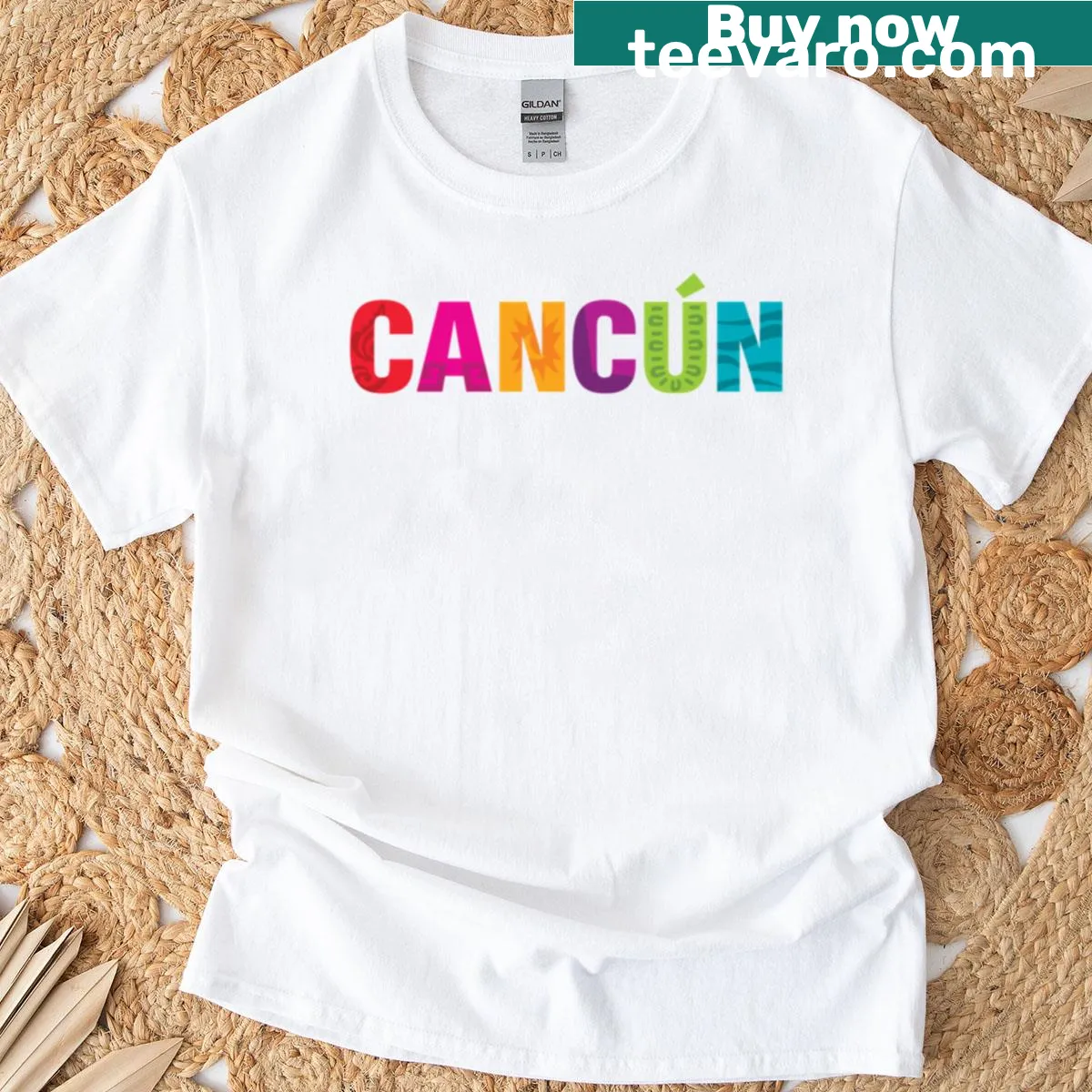 Cancun logo t-shirt with bold typography design — on a men's t-shirt