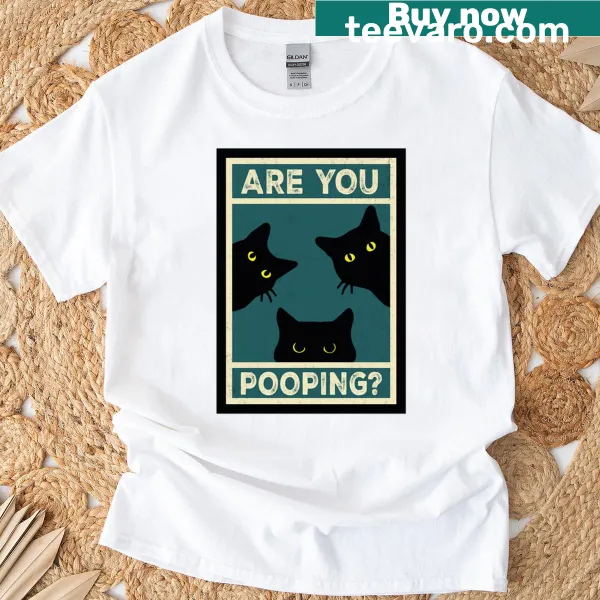 Funny cat-themed t-shirt with humorous text about cat habits