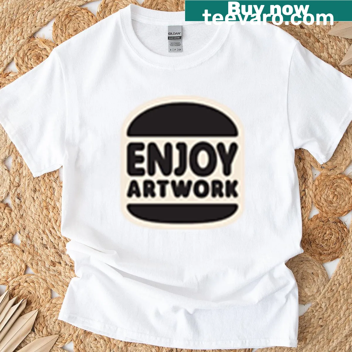 Minimalist black T-shirt with 'Enjoy' printed on it — on a men's t-shirt