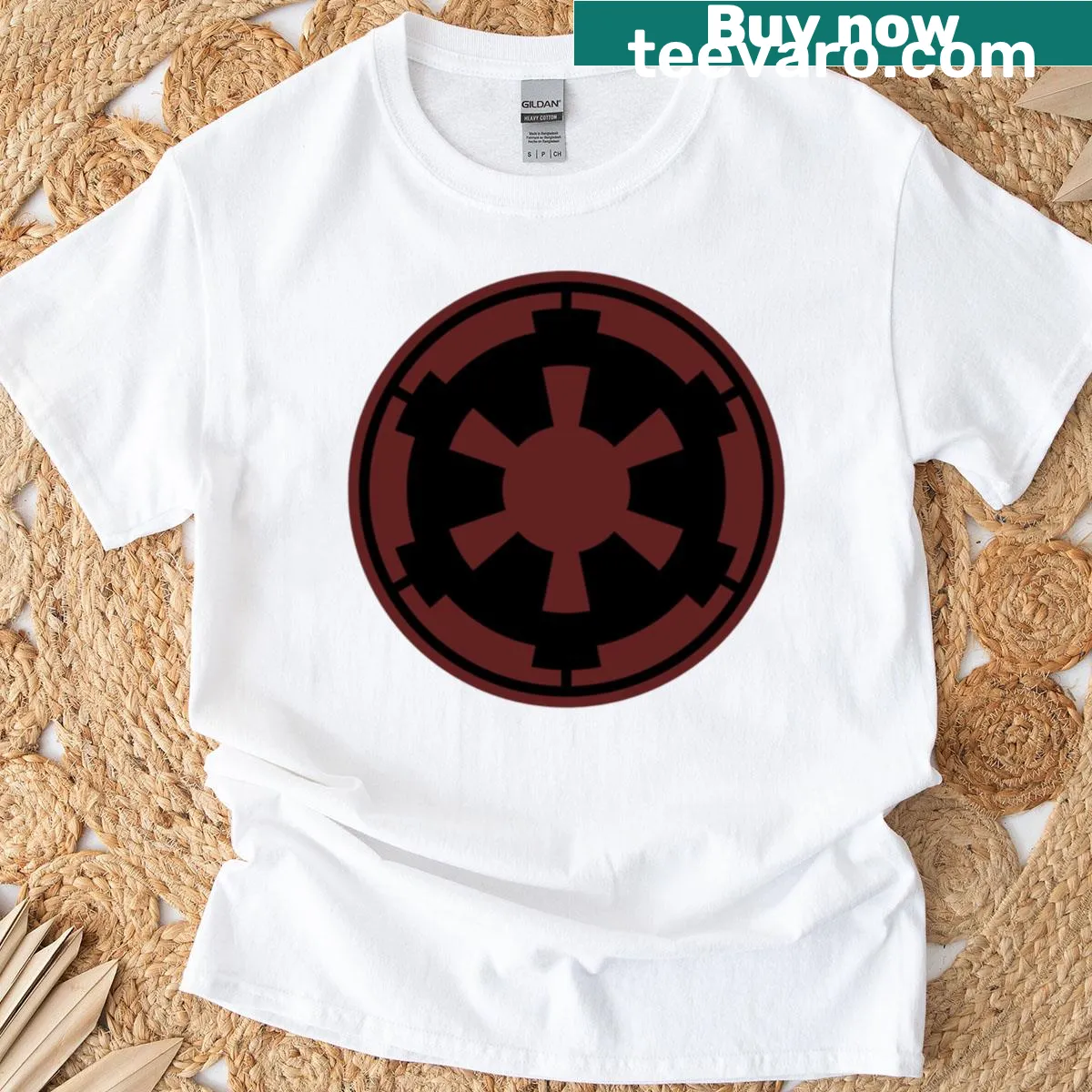 T-shirt featuring a prominent red imperial crest logo — on a men's t-shirt