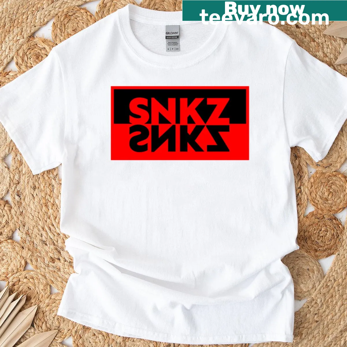 Mirrored Snkz logo graphic on a T-shirt. — on a men's t-shirt