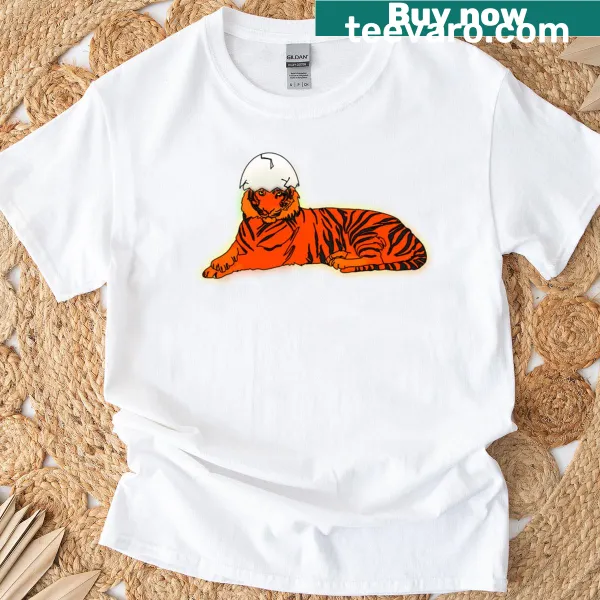Cute illustration of a tiger in an eggshell hat on a t-shirt