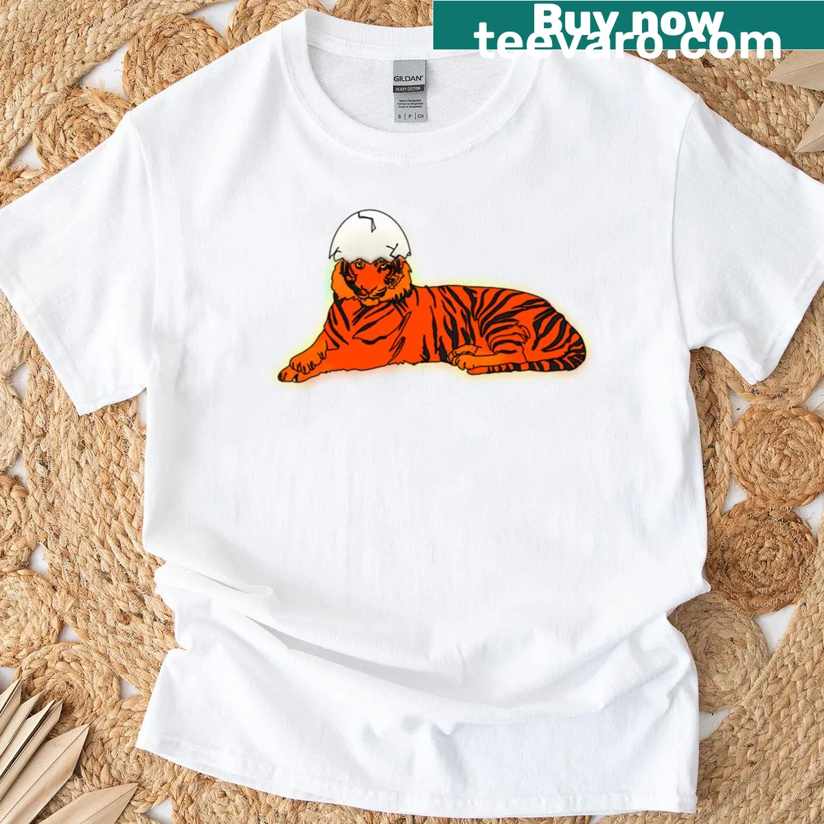 Cute illustration of a tiger in an eggshell hat on a t-shirt — on a men's t-shirt