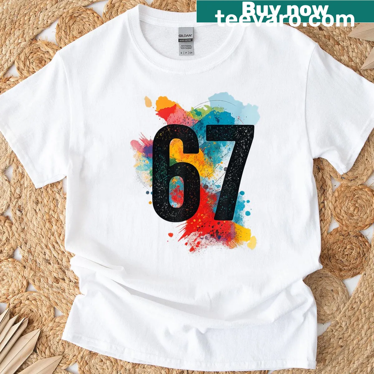 Colorful paint splash graphic with the number 67 on a humorous tee. — on a men's t-shirt