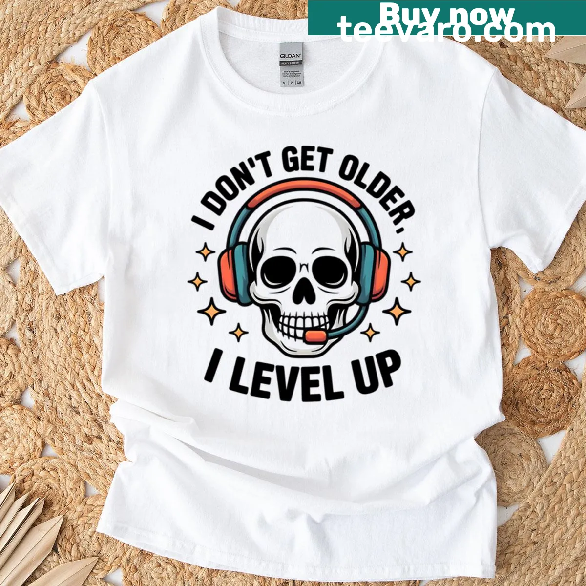 Retro gamer skull graphic t-shirt with headset and 'Level Up' text — on a men's t-shirt
