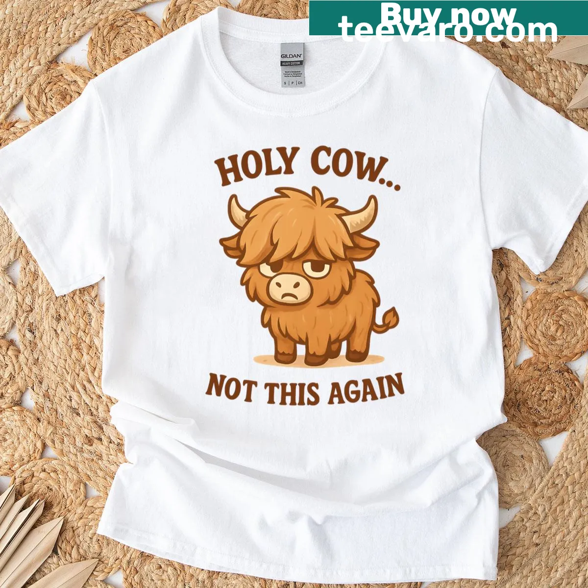 Funny t-shirt featuring a grumpy Highland cow with humorous text — on a men's t-shirt