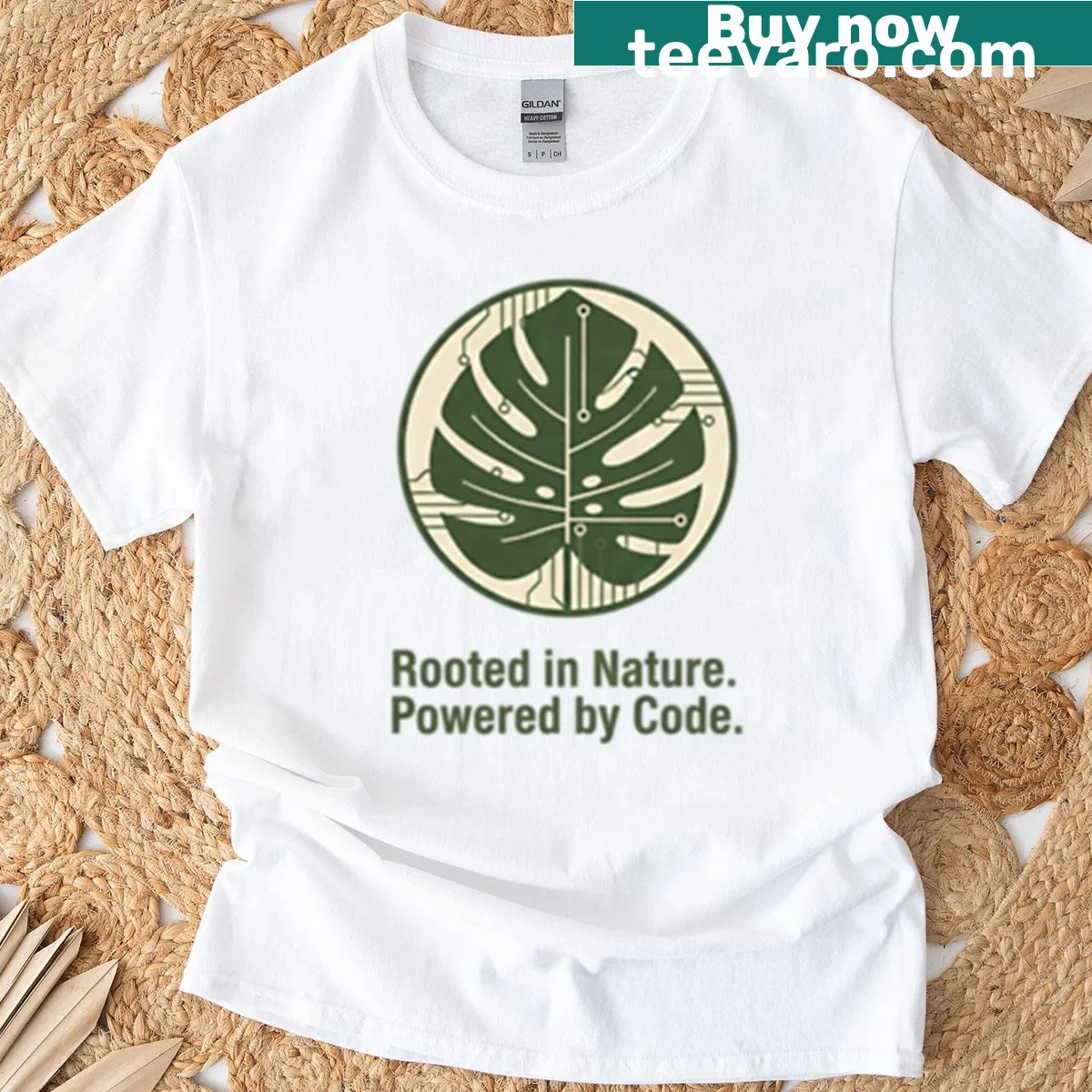 Monstera leaf graphic combined with technology code illustration — on a men's t-shirt
