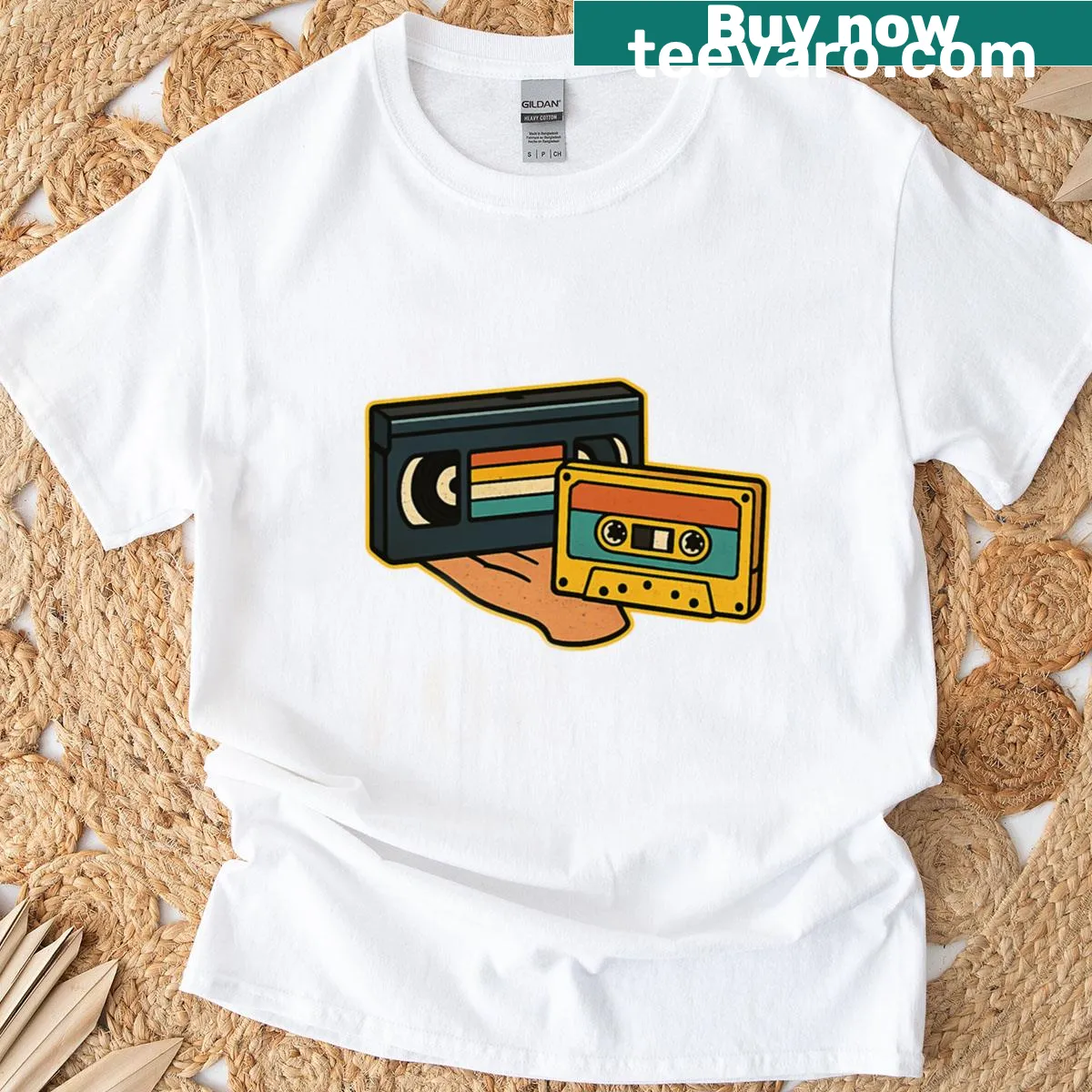Oversized T-shirt with a nostalgic cassette tape and VHS graphic — on a men's t-shirt