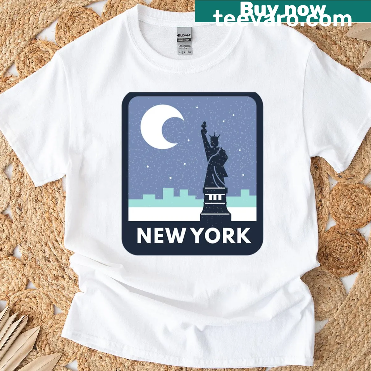 Artistic T-shirt featuring NYC skyline at night — on a men's t-shirt