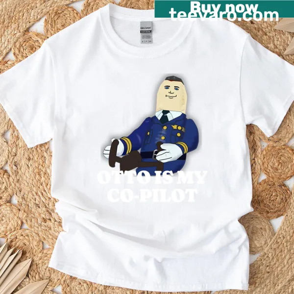 Cartoon graphic of Otto the dog as co-pilot on T-shirt.
