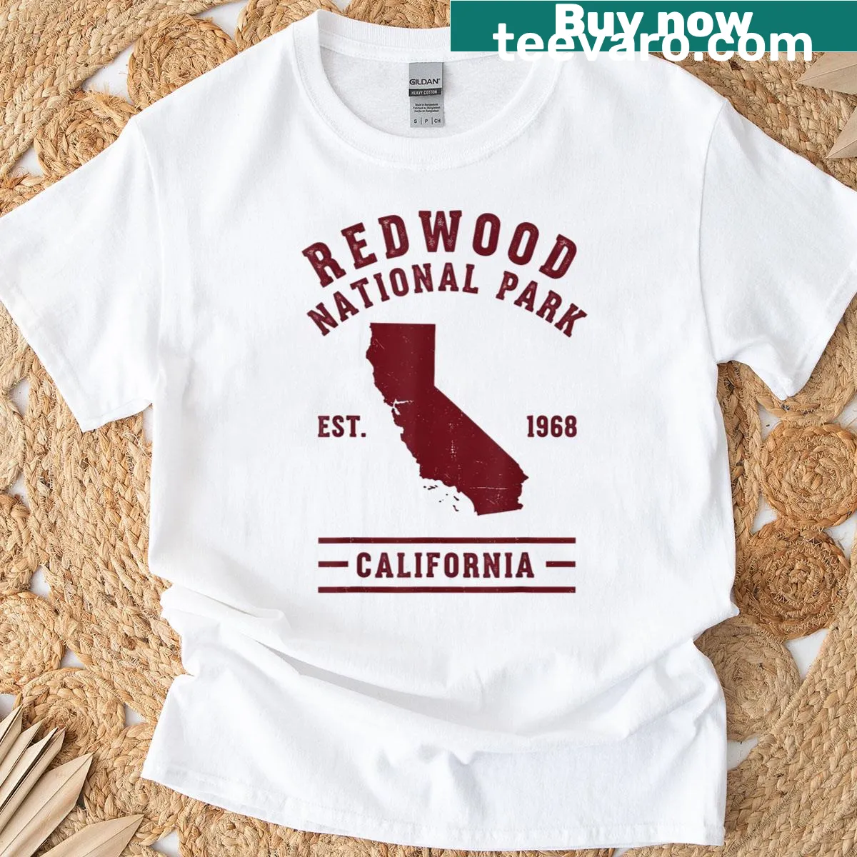 Illustrated design of Redwood trees with text Est 1968 — on a men's t-shirt