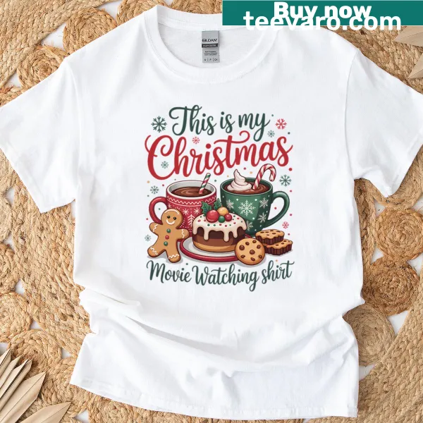 Playful Christmas movie T-shirt featuring Santa and Christmas tree