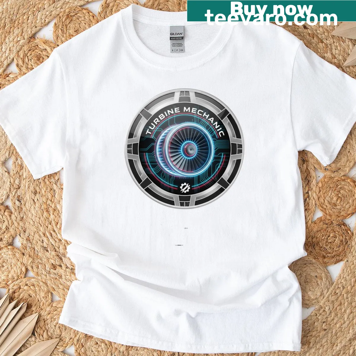 Turbine mechanic t-shirt with badge emblem design — on a men's t-shirt
