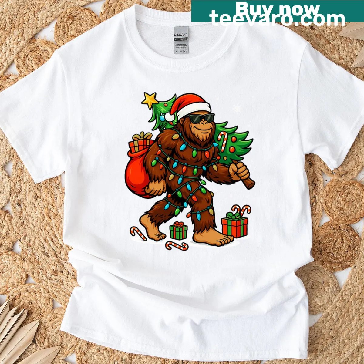 Vintage T-shirt featuring Bigfoot with holiday lights and a Christmas tree — on a men's t-shirt
