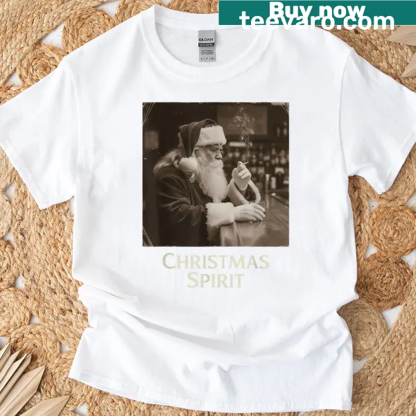 Vintage Santa Claus smoking design on a distressed Christmas shirt.