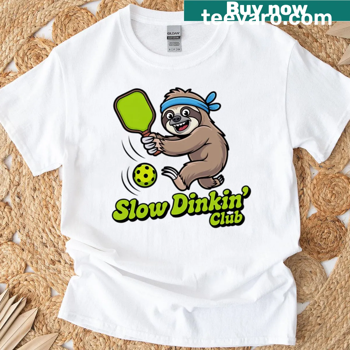 Illustration of a sloth playing pickleball, representing the Slow Dinkin' Club — on a men's t-shirt