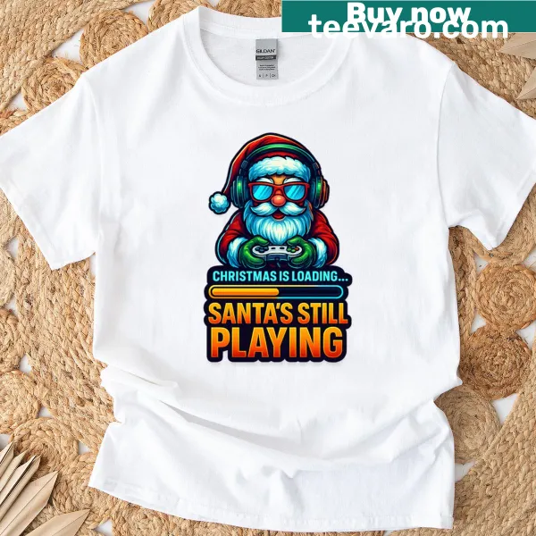 Playful t-shirt featuring 'Christmas Is Loading' with Santa gaming