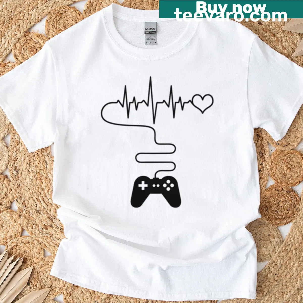 Minimalist t-shirt with heartbeat and gaming controller design. — on a men's t-shirt