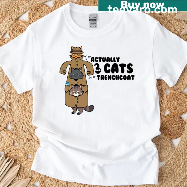 T-shirt depicting three cats in a trench coat illustration