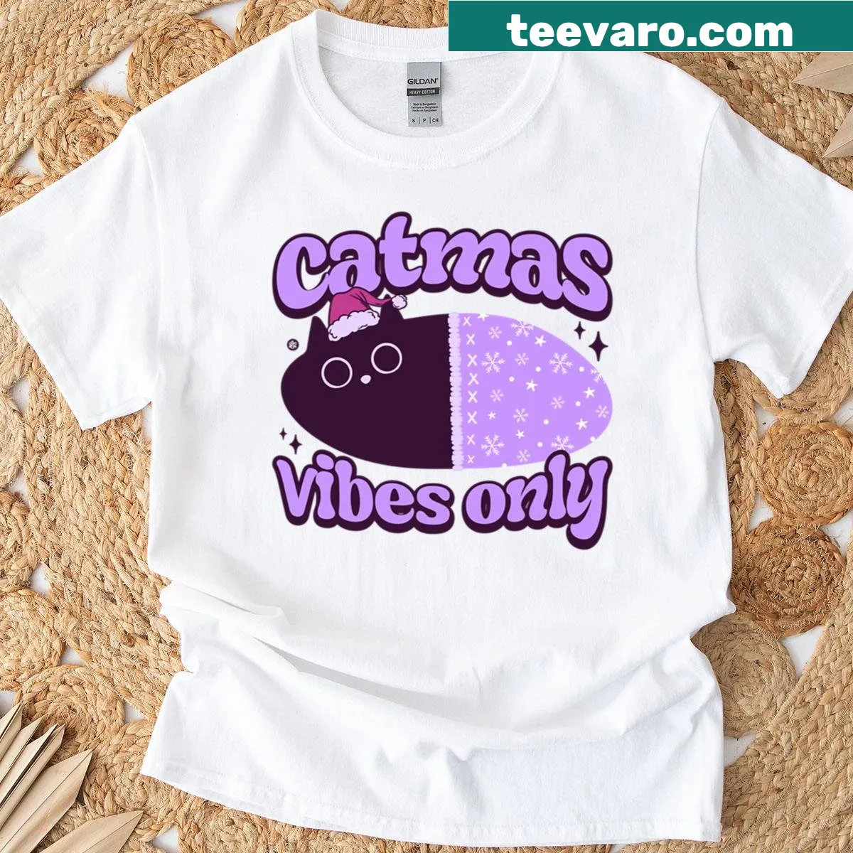 Oversized t-shirt with 'Catmas Vibes Only' text design — on a men's t-shirt