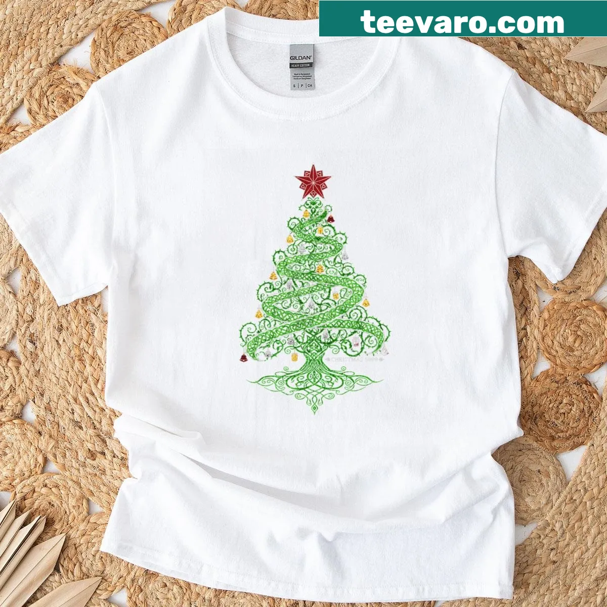 T-shirt featuring a Celtic Christmas tree graphic — on a men's t-shirt